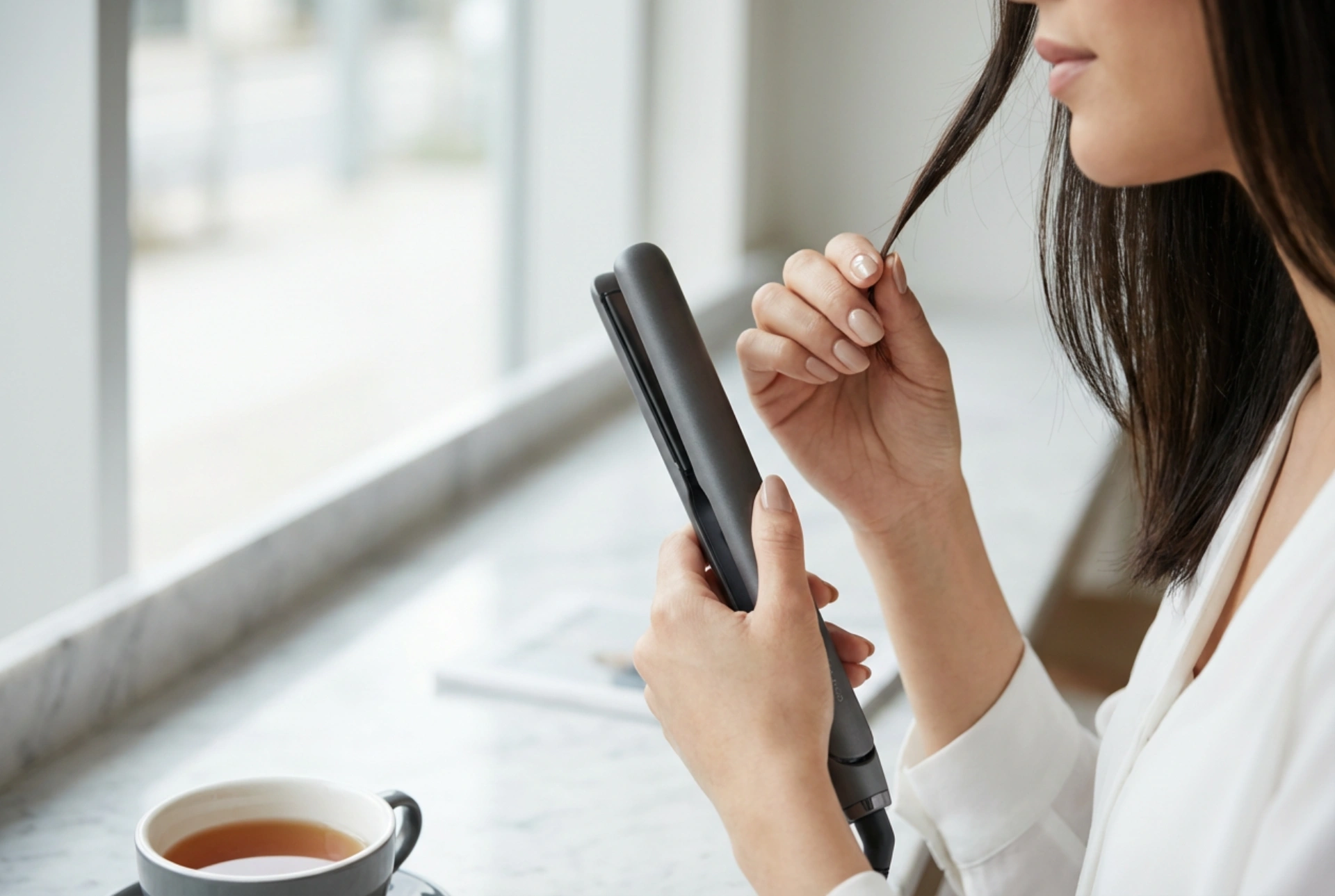 Prijenosni uređaj za ravnanje kose: brzi popravci frizure izvan kuće